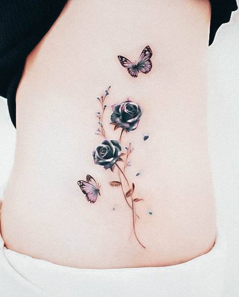 Artistic Small Butterfly Tattoo On Woman