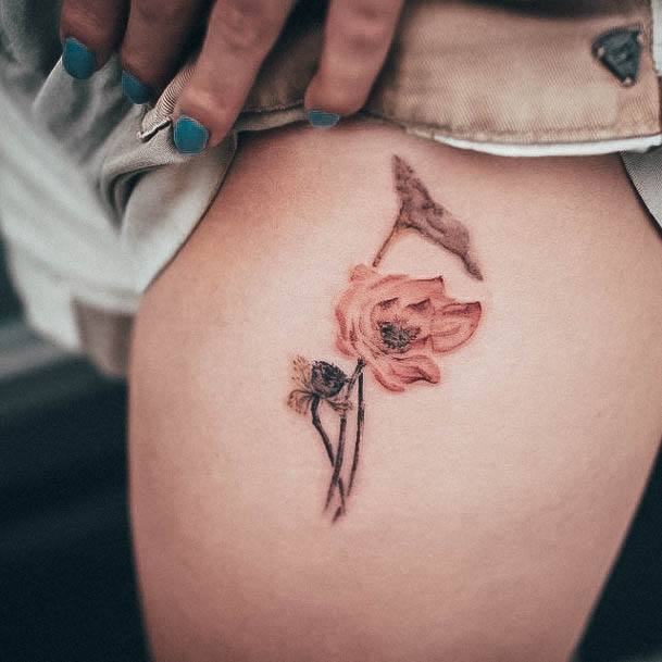 Artistic Small Flower Tattoo On Woman