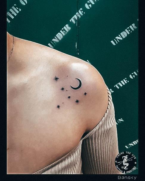 Artistic Star Tattoo On Woman Shoulders