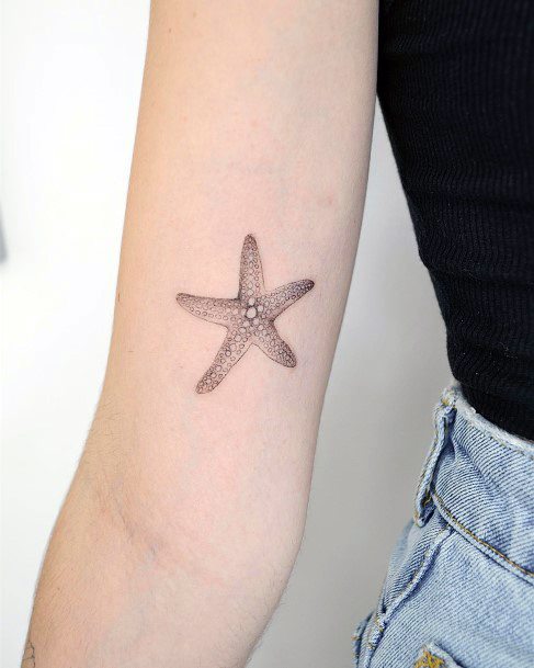 Artistic Starfish Tattoo On Woman