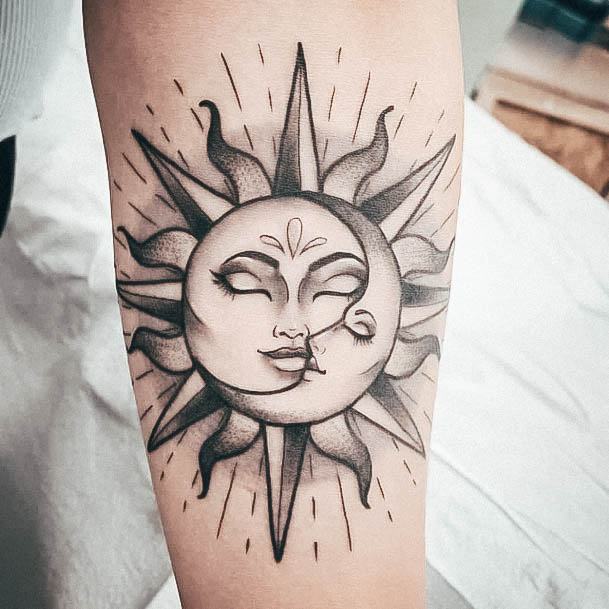 Artistic Sun And Moon Tattoo On Woman Arm