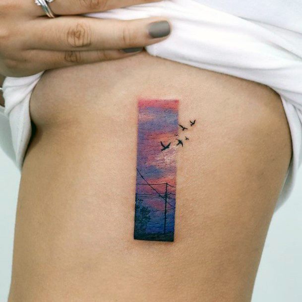 Artistic Sunset Sunrise Tattoo On Woman