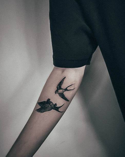 Artistic Swallow Tattoo On Woman