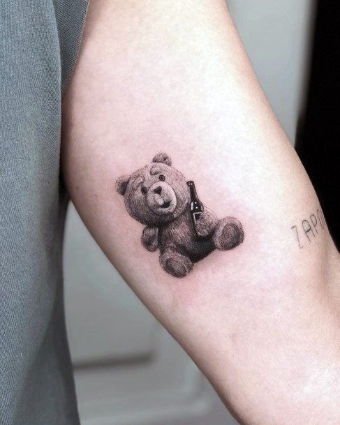 Artistic Teddy Bear Tattoo On Woman