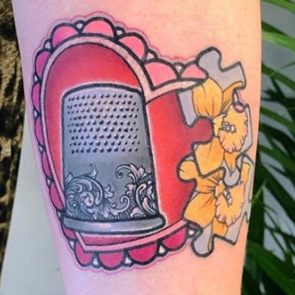 Artistic Thimble Tattoo On Woman