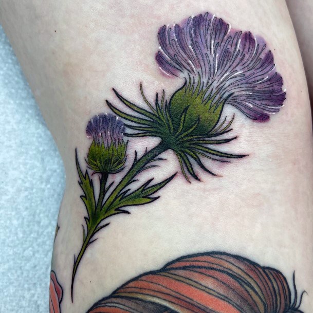 Artistic Thistle Tattoo On Woman