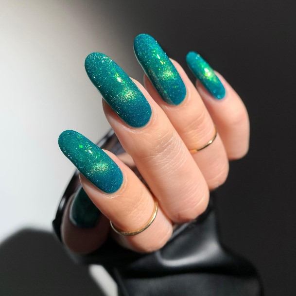 Artistic Turquoise Ombre Nail On Woman