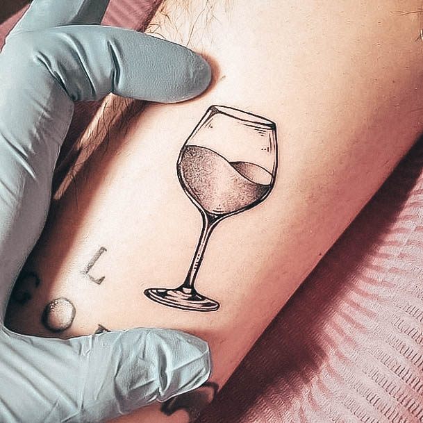 Artistic Wine Glass Tattoo On Woman