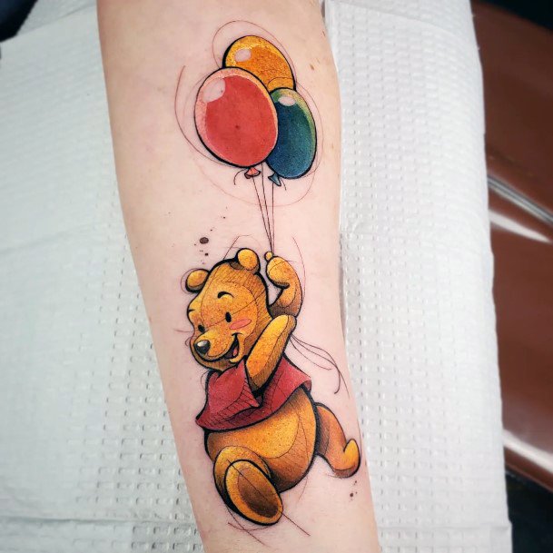 Artistic Winnie The Pooh Tattoo On Woman