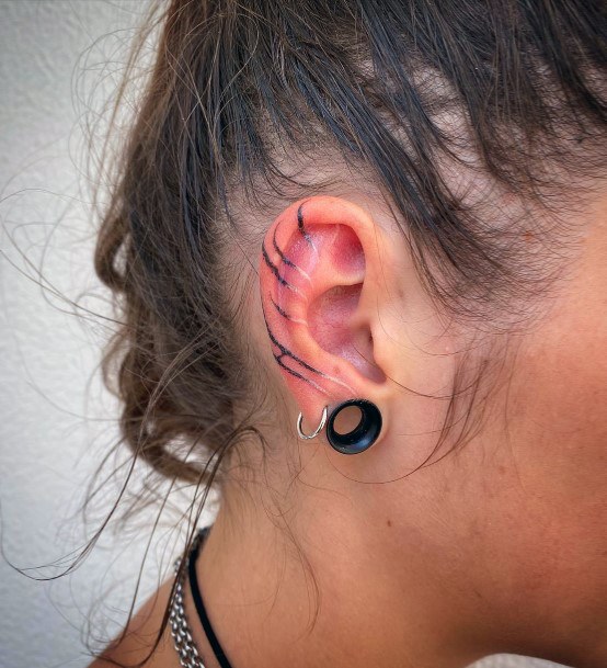 Astonishing Ear Tattoo For Girls