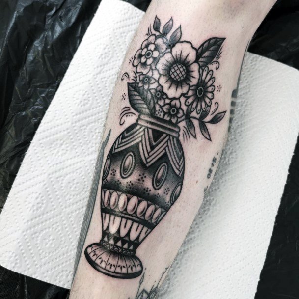 Astonishing Flower Vase Tattoo For Girls