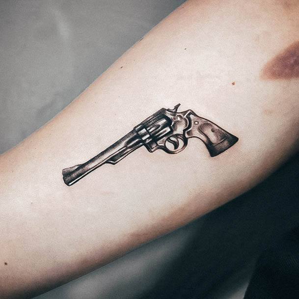 Astonishing Gun Tattoo For Girls Arm