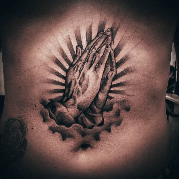 praying hands with rosary tattoo on chest