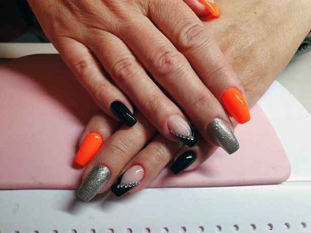 Astonishing Vibrant Orange Sparkly Silver And Black Halloween Nail Design For Women