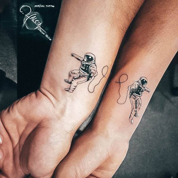 Astronaut Tattoo Feminine Designs