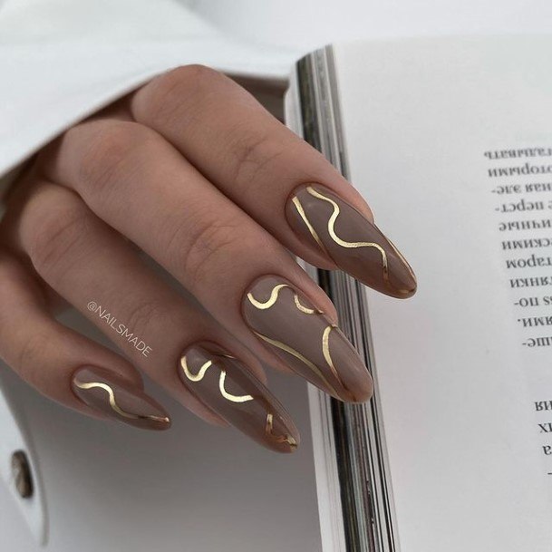 Attractive Girls Nail Metallic Gold