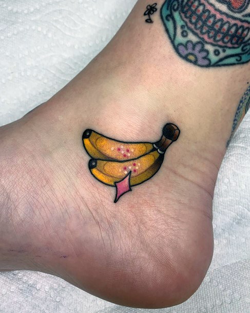 Attractive Girls Tattoo Banana