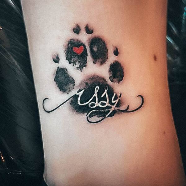 Attractive Girls Tattoo Paw Print Name