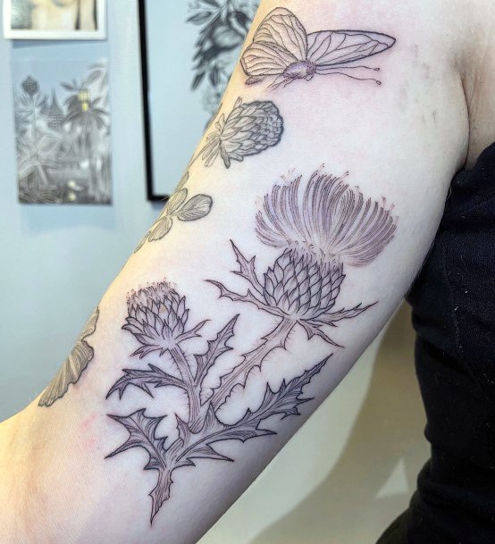 Attractive Girls Tattoo Thistle