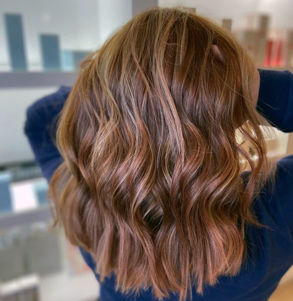 Autumn Brunette With Highlights And Wavy Hair