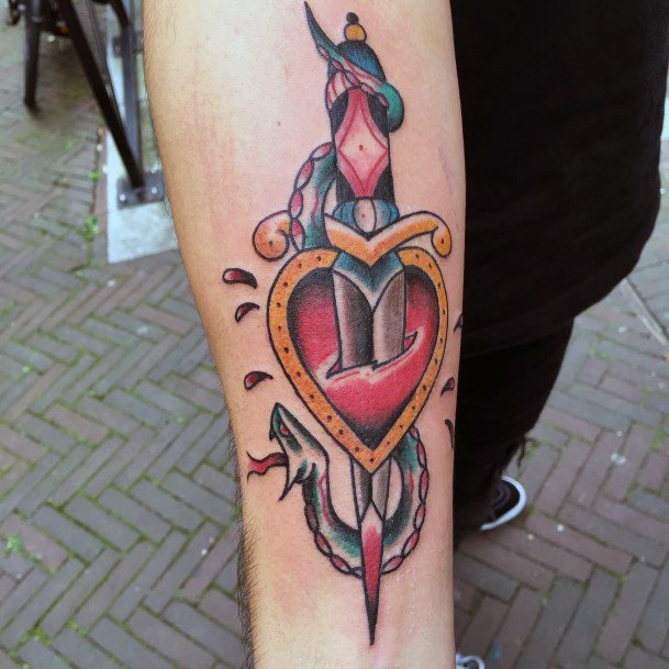 Awesome Dagger Heart Tattoos For Women