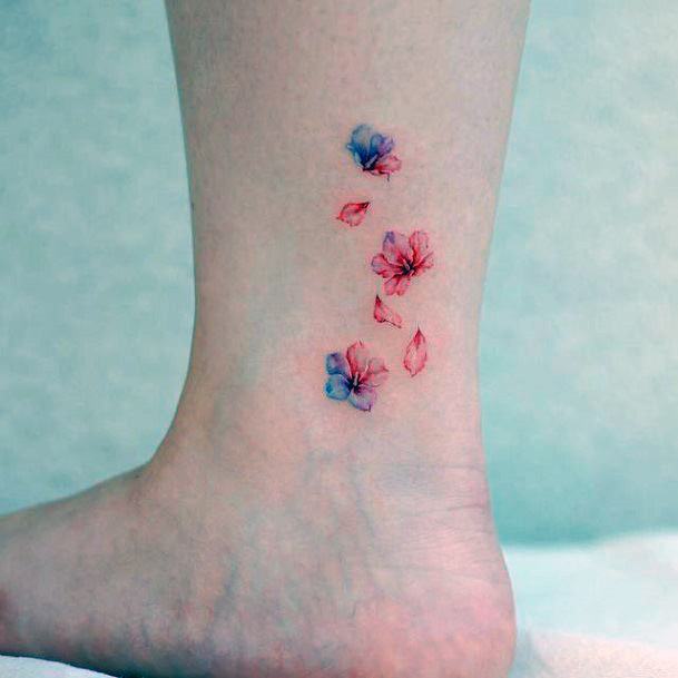 Awesome Flower Petal Tattoos For Women