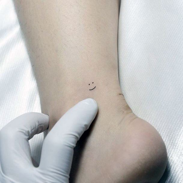Awesome Smiley Face Tattoos For Women