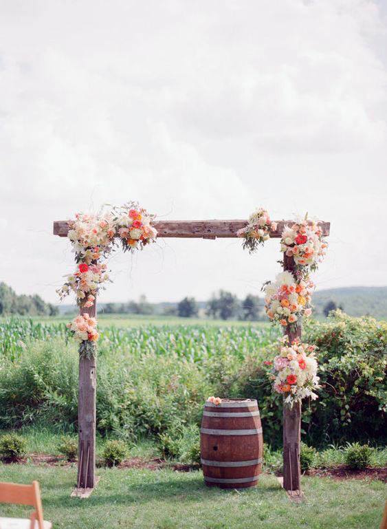 Barrel And September Wedding Flowers On Arch