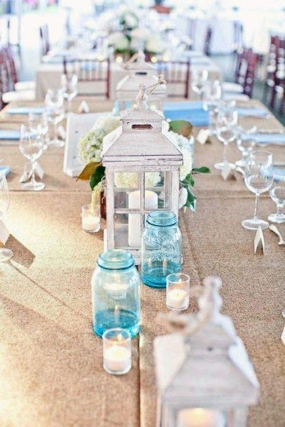 Beach Wedding Ideas White Lanterns And Ocean Blue Glassware