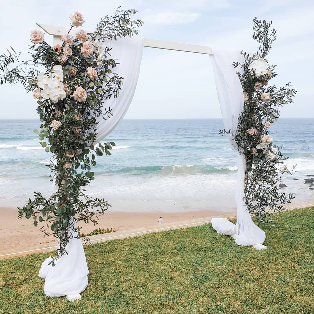 Beachside Wedding Arch Flowers