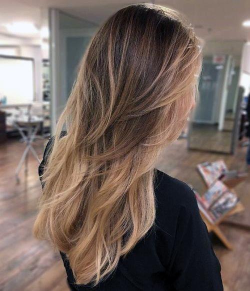 Beachy Brown And Blonde Textured Layered Bouncy Ombre Women’s Hairstyle