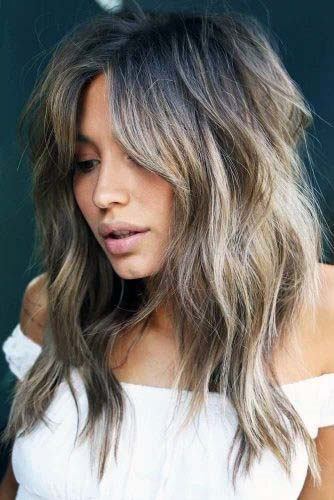 Beachy Textured Dark Rooted Blonde Shag Ombre Womens Hairstyle