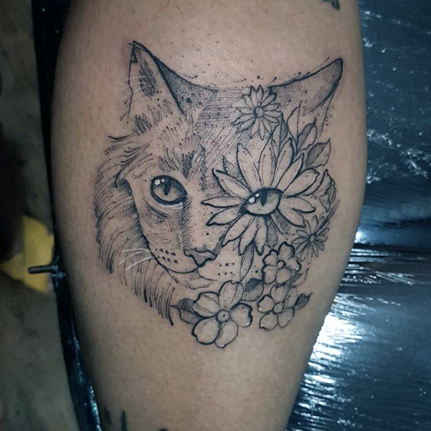 Beady Eyed Cat Tattoo With Flowers Tattoo