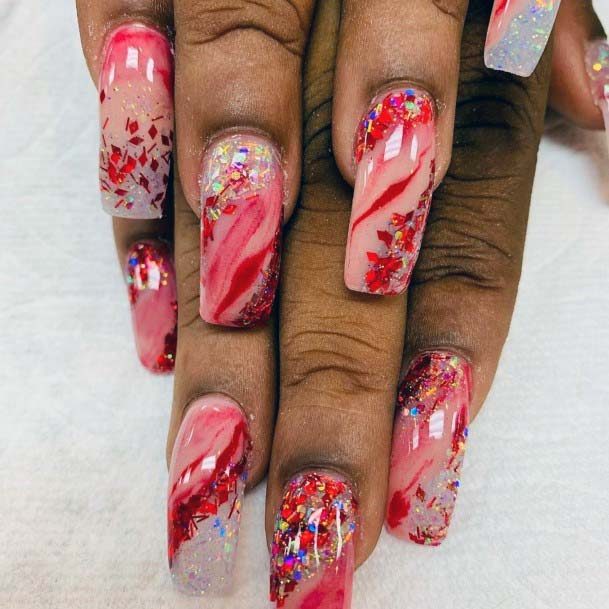 Beauitful Glitters On Marble Top Designed Red Nails