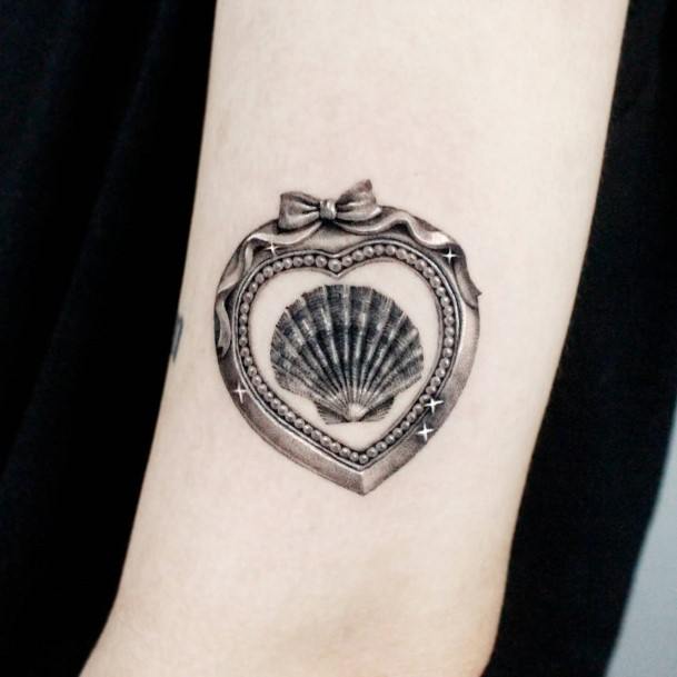 Beauteous Girls Clam Tattoos