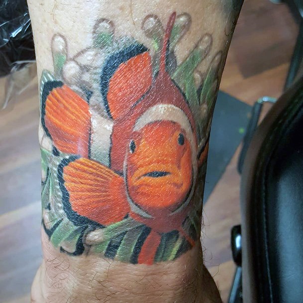 Beauteous Girls Clown Fish Tattoos