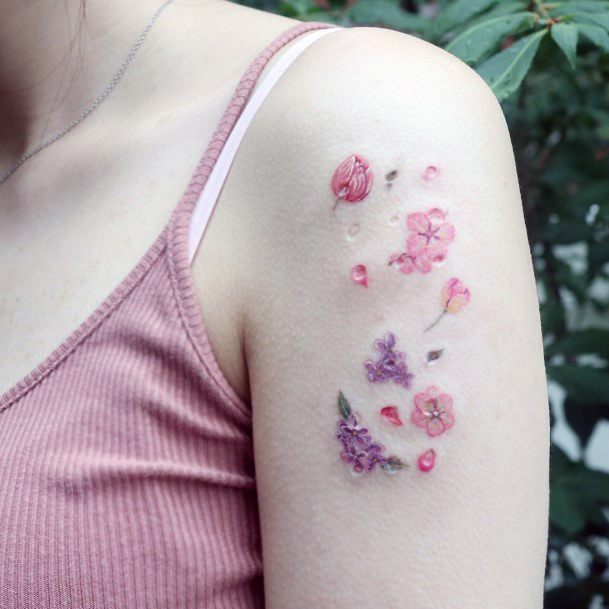 Beauteous Girls Flower Petal Tattoos