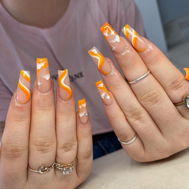 Beauteous Girls Orange And White Nails