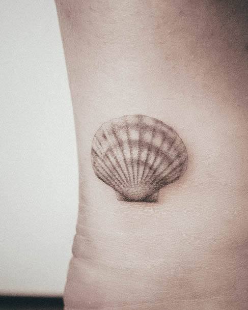 Beauteous Girls Seashell Tattoos