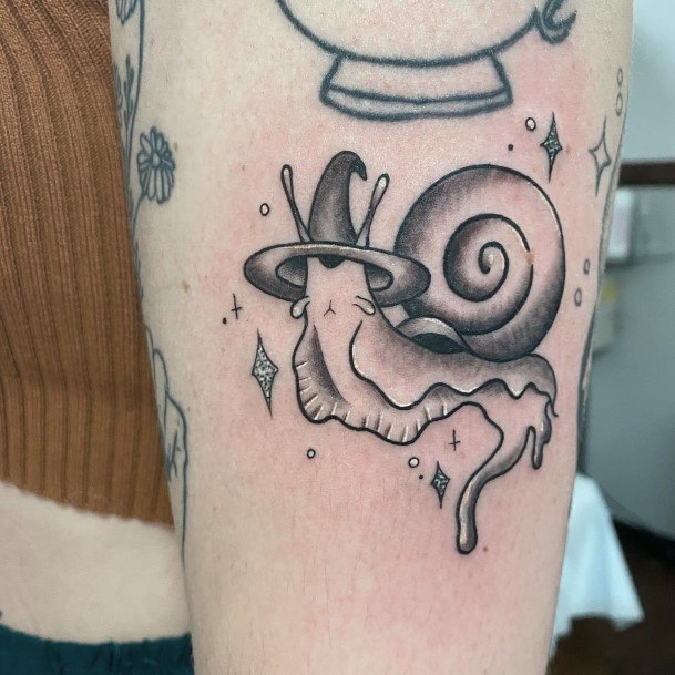 Beauteous Girls Snail Tattoos