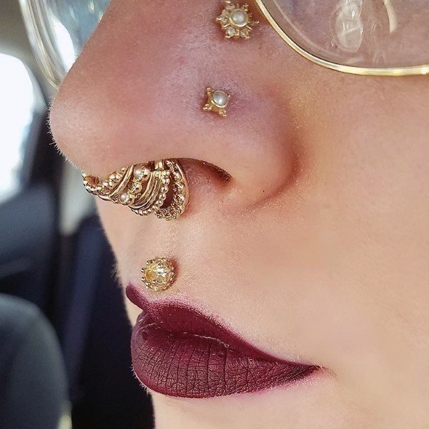 Beautife Intricate And Unique Multiple Gold Septum Exquisite Medusa Shiny Nostril And Targus Face Piercing Inspiration For Girls