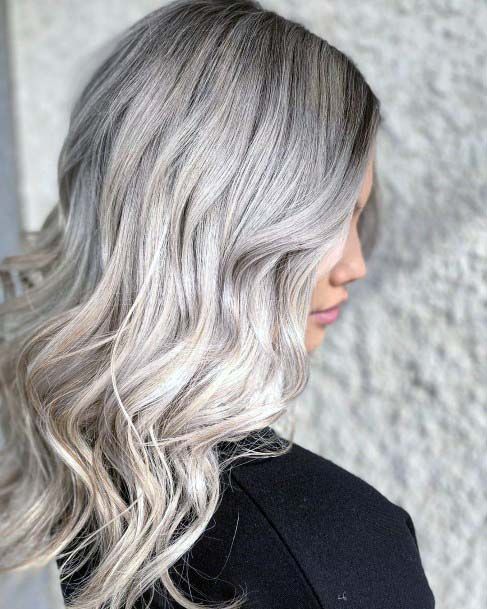 Beautiful Ashy Dark Rooted Platinum Blonde Curly Textured Womens Hairstyle