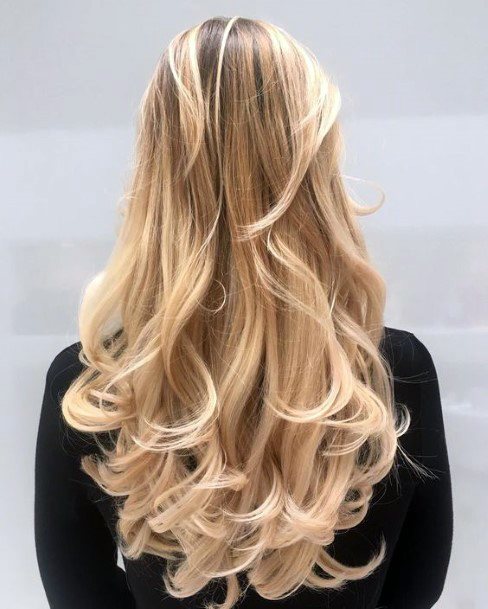 Beautiful Barbie Blonde Layered And Textured Bouncy Women’s Hairstyle Idea