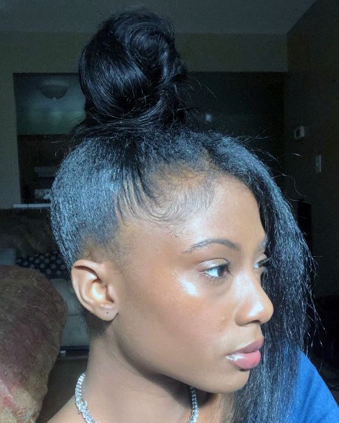 Beautiful Black Woman With A Half Attempted Top Knot Hairstyle