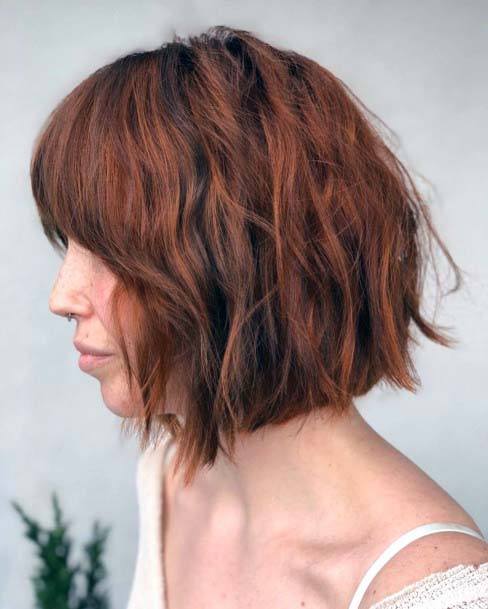 Beautiful Bright Redhead Highlighted Short Bang Shag Womens Hairstyle Idea