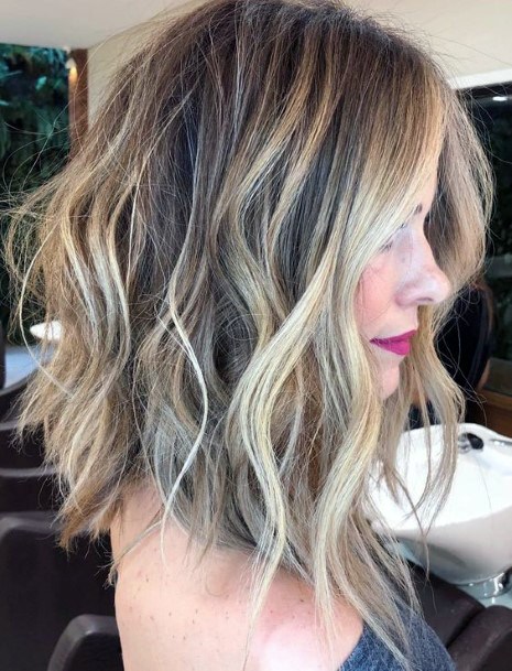 Beautiful Brown And Blonde Layered Textured Bouncy Women’s Hairstyle Idea