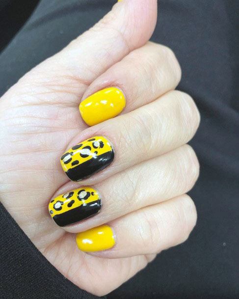 Beautiful Classy Black And Yellow Animal Print Design Nails For Girls