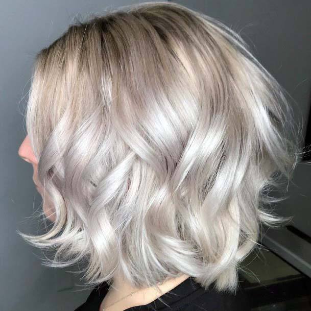 Beautiful Dark Rooted Ashy Grey Platinum Blonde Curly Womens Hairstyle