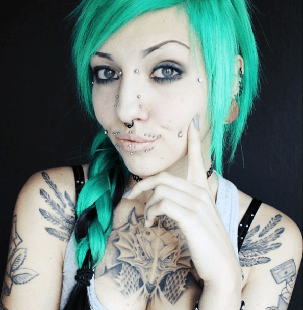 Beautiful Gothic Lip Cheek Nose Face Piercings And Dermal Designs For Girls