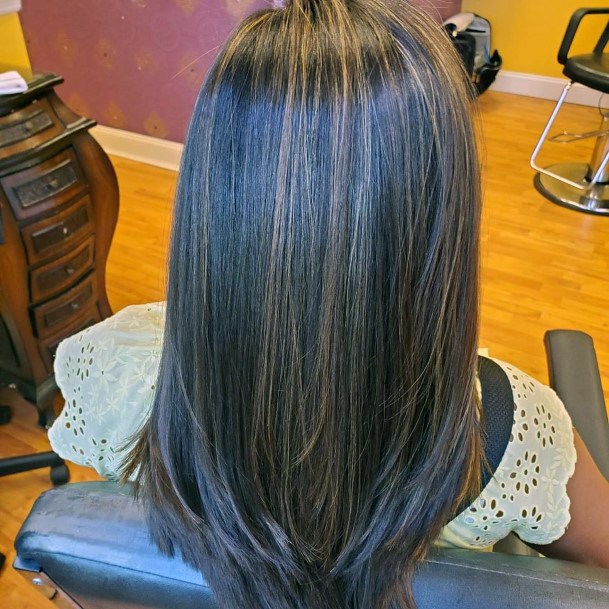 Beautiful Light Blonde And Brunette Highlights In Sleek Womens Hairstyle